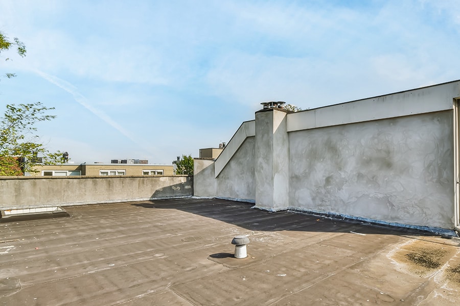 commercial flat roof that is in need of inspection and repair