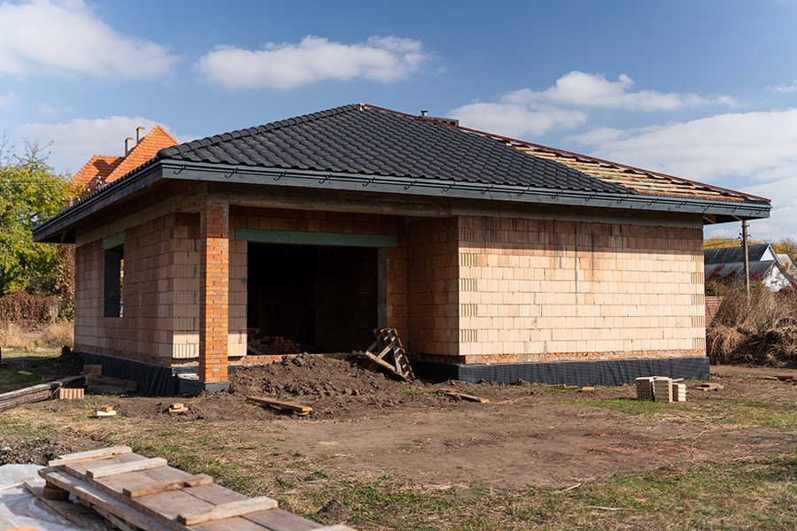 new construction house receiving a custom designed tile roof