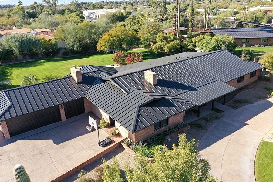 House Updated With New Black Standing Seam Roof